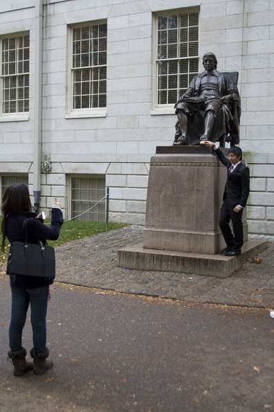 315-0564 Posing with Statue of John Harvard.jpg